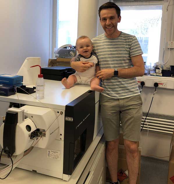 My-son-and-I-in-lab-and-the-mass-spectrometer-I-mainly-used-for-my-PhD-work